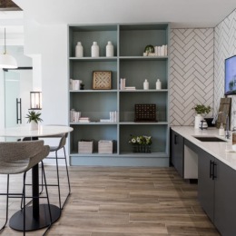 lounge and wooden floored area with seating