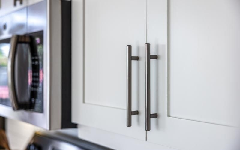close up of fixtures and modern appliances in a bright kitchen