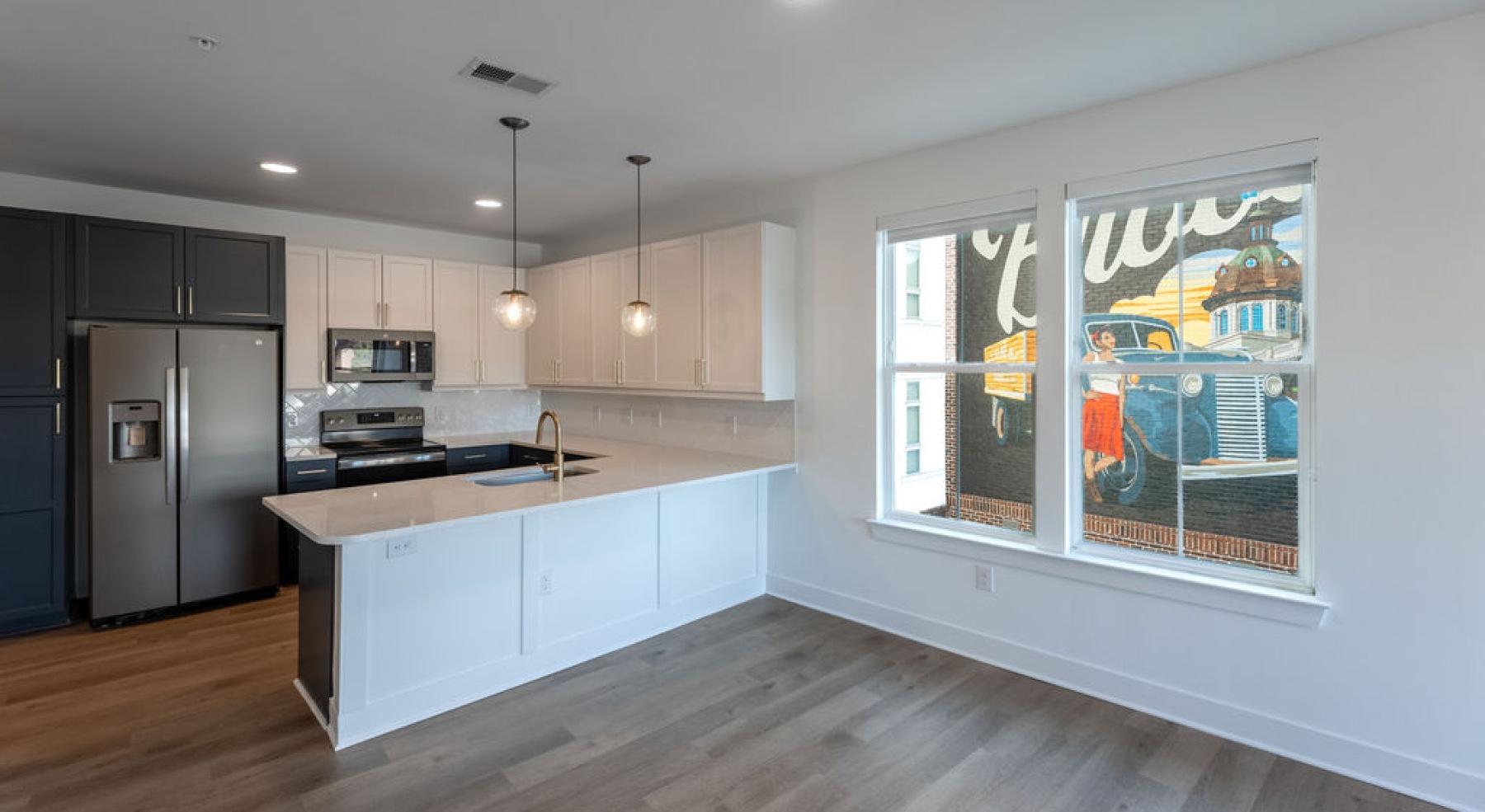 spacious kitchen with large windows
